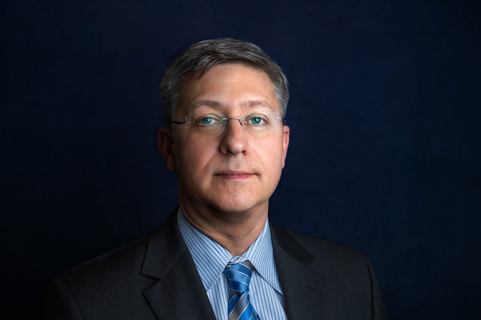 Corporate headshot of a law firm partner photographed in New Jersey