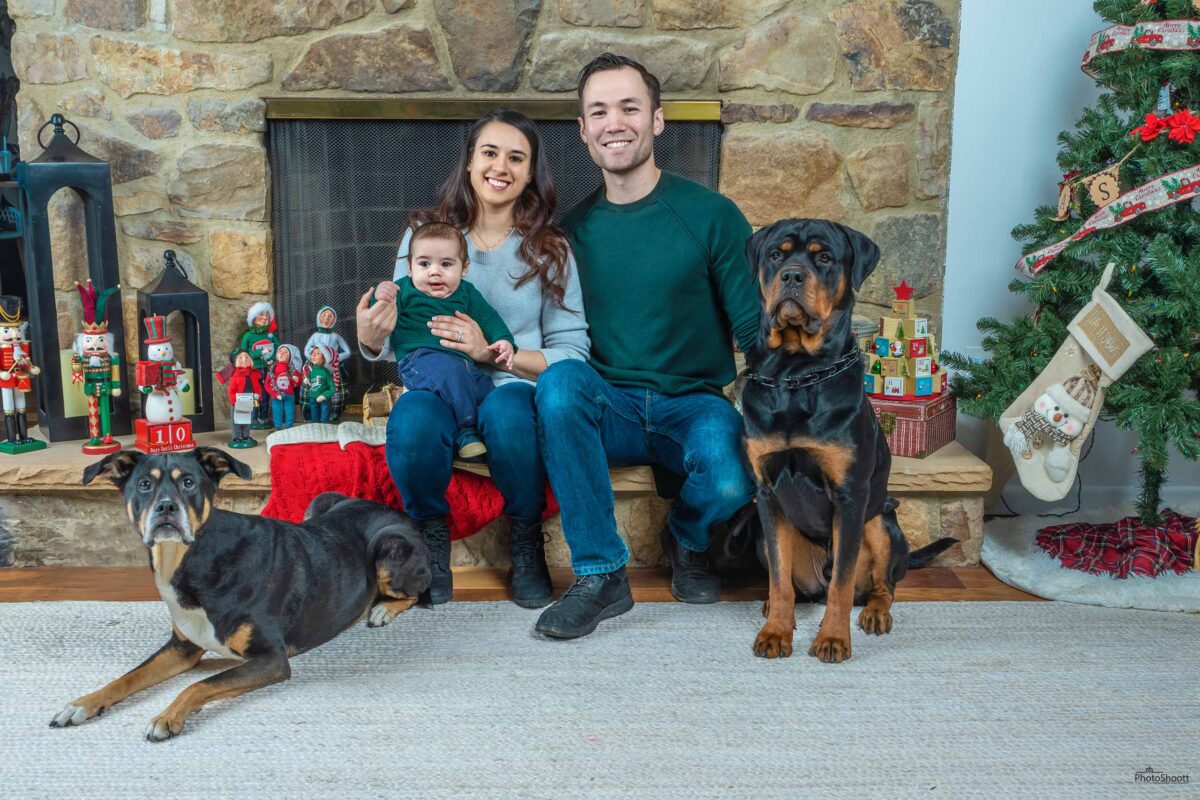 Family portrait at home with the family dogs