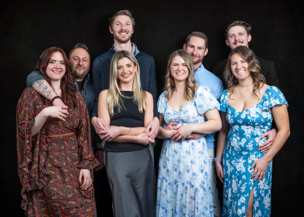 Casey and Bobby with friends and family at their engagement party