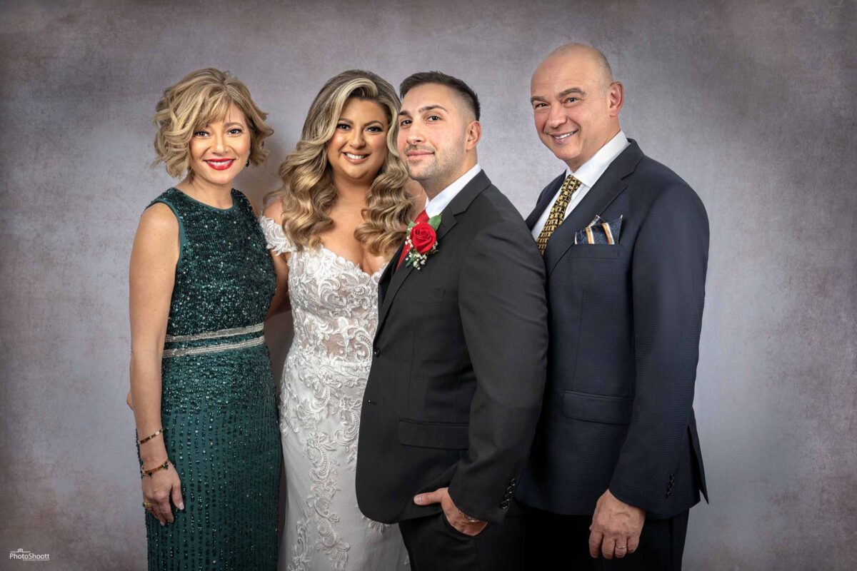 Guests posing together at a formal celebration
