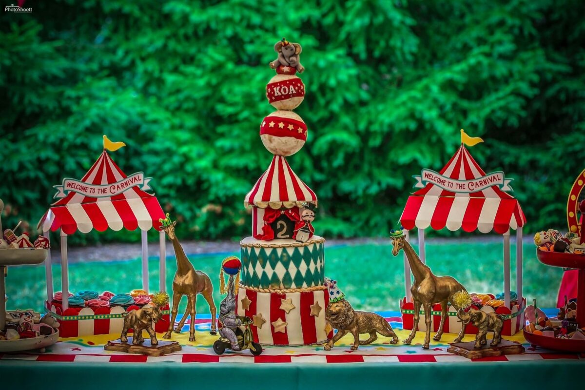Carnival-themed party decorations with a carousel display
