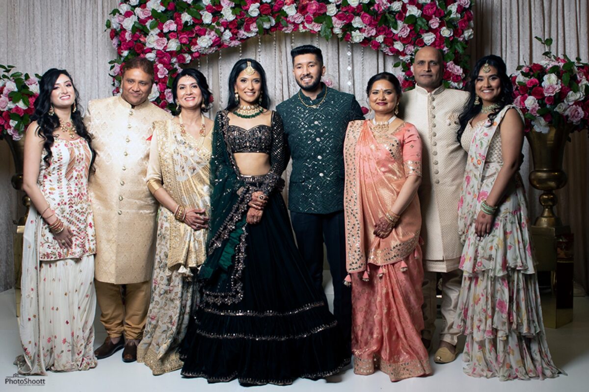 Guests in traditional dress at a South Asian celebration