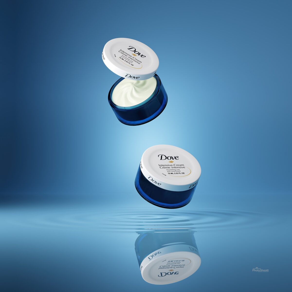 Dove skincare jars on a blue backdrop