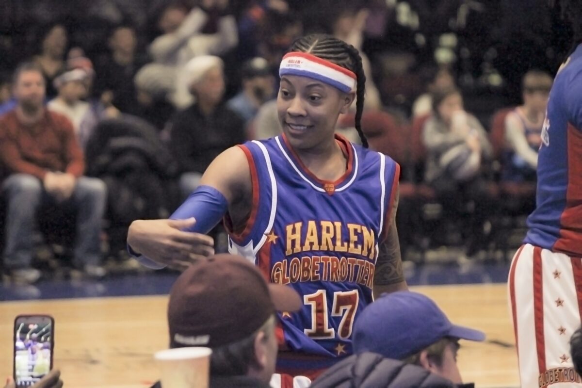 Harlem Globetrotters player smiling on court