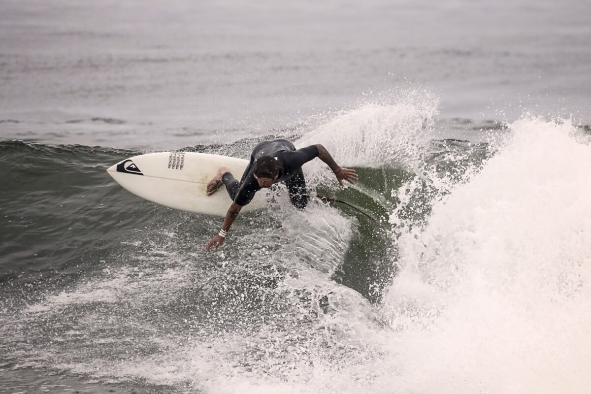 Surfer turning on the face of a wave