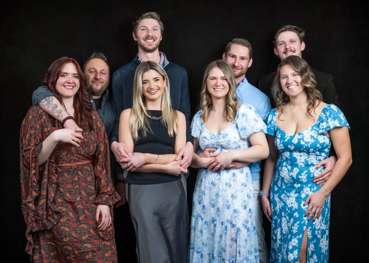 Casey and Bobby with friends and family at their engagement party