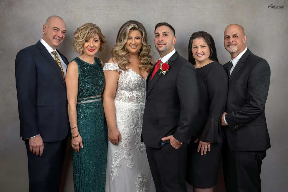 Family group in formal wear at a milestone party