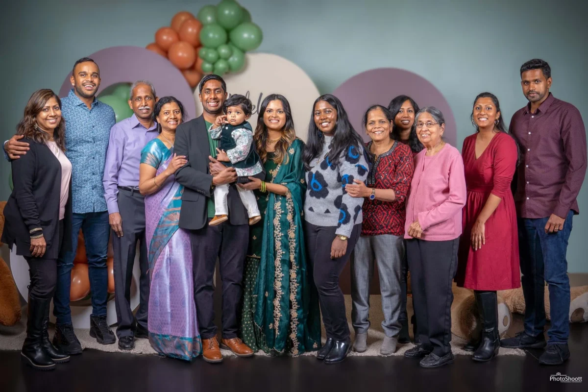Family group photo at a first birthday party