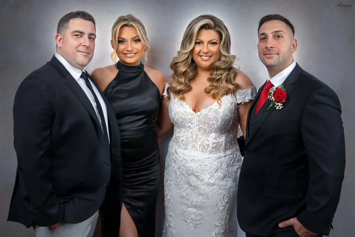 Formal family group portrait at an evening celebration