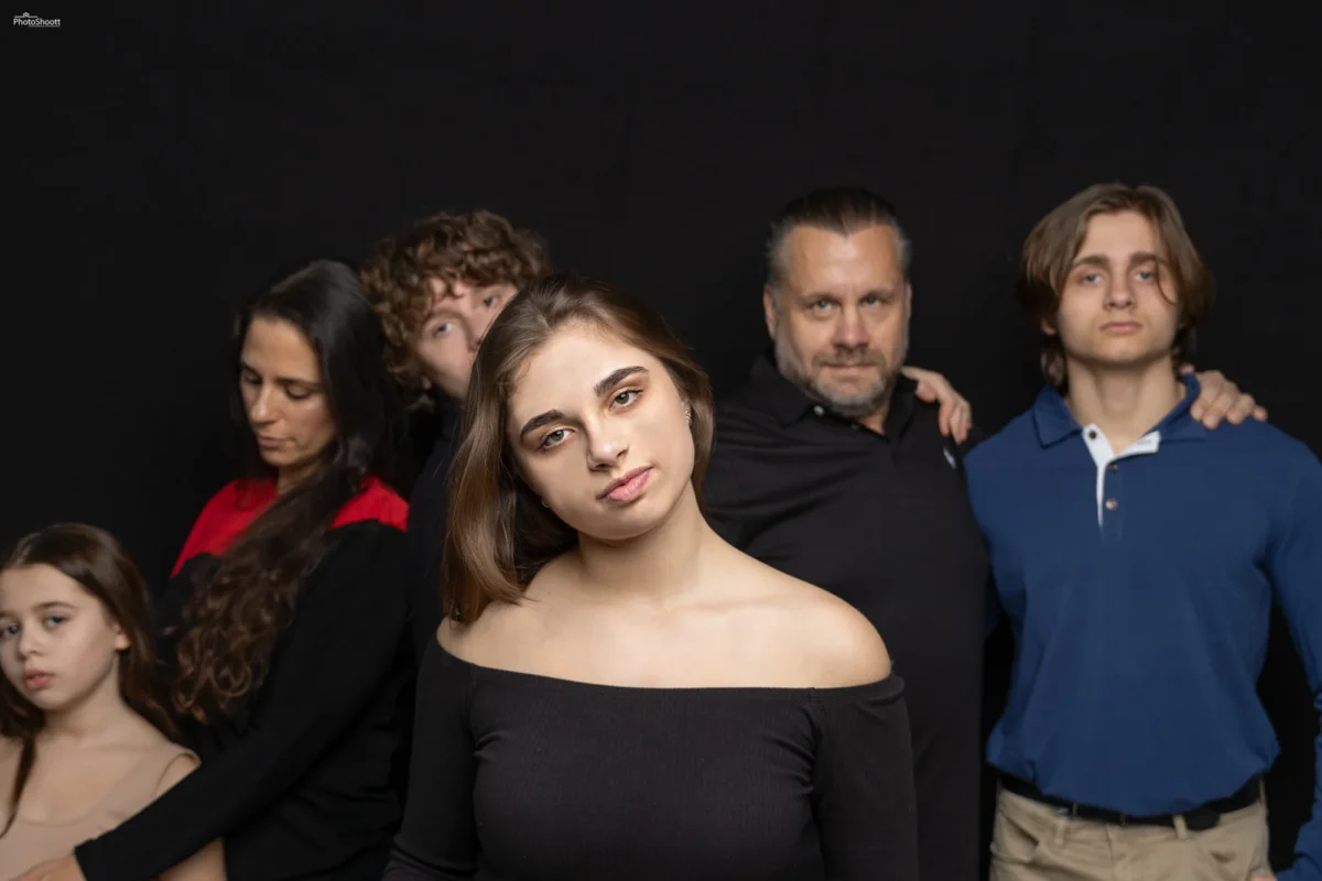 Group portrait at an indoor family celebration
