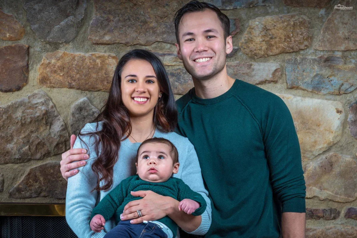 Parents holding their baby during a family portrait session